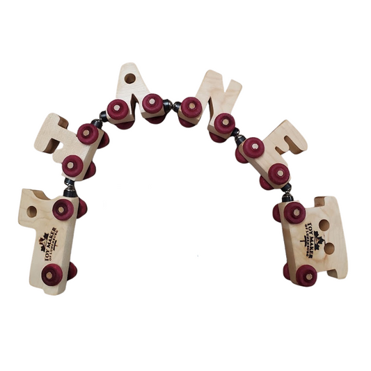 Wooden toy with wheels spelling out 'Jane' on a white background