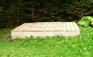 Wooden sandbox with foldable seats