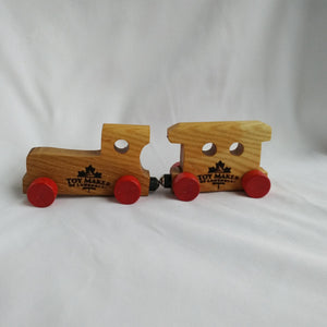 Wooden train and  individual letters
