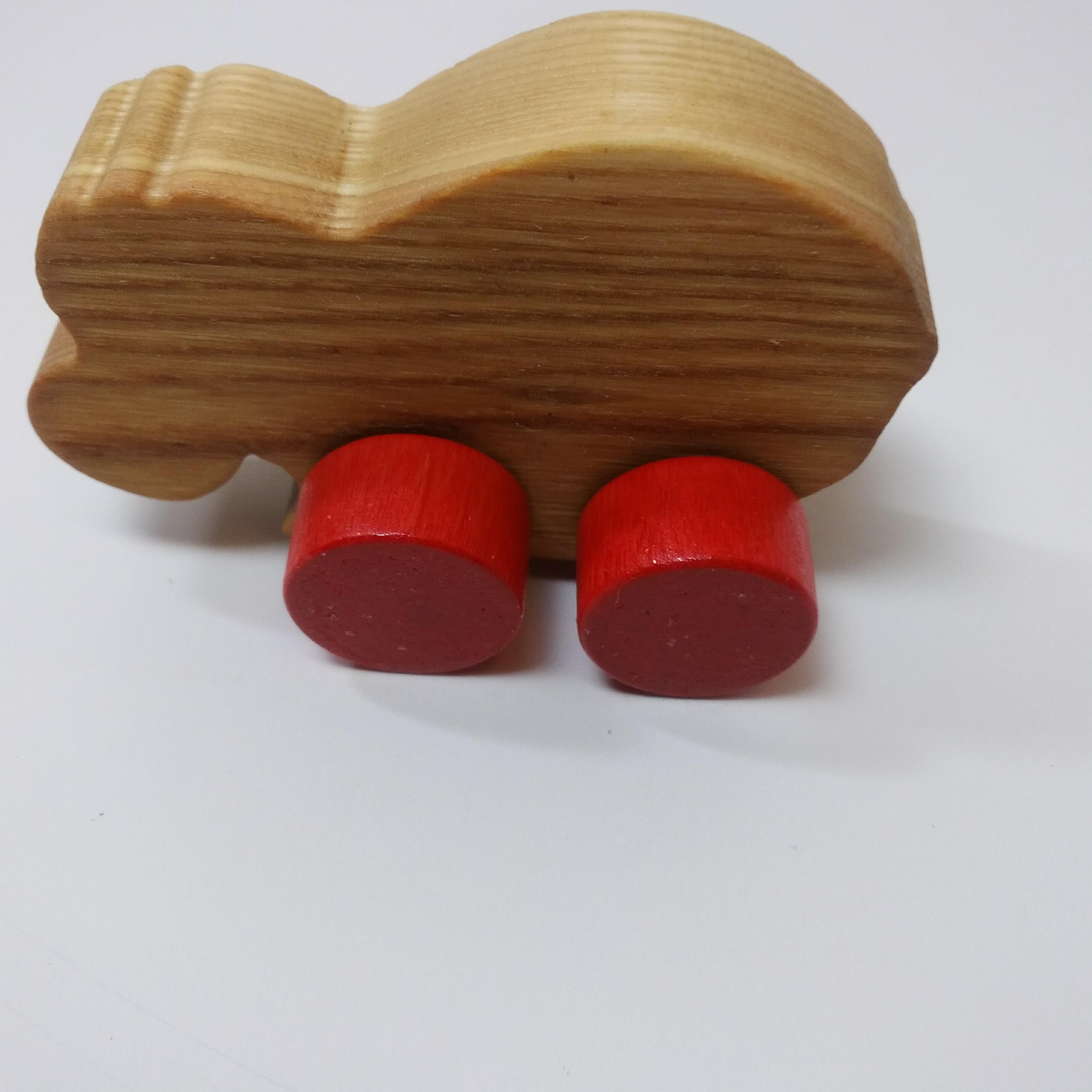 Wooden hippo with wheels