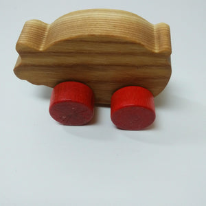 Wooden piggy with wheels