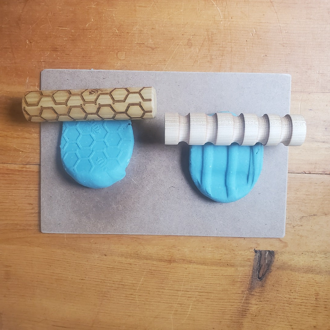play dough with wooden tools 