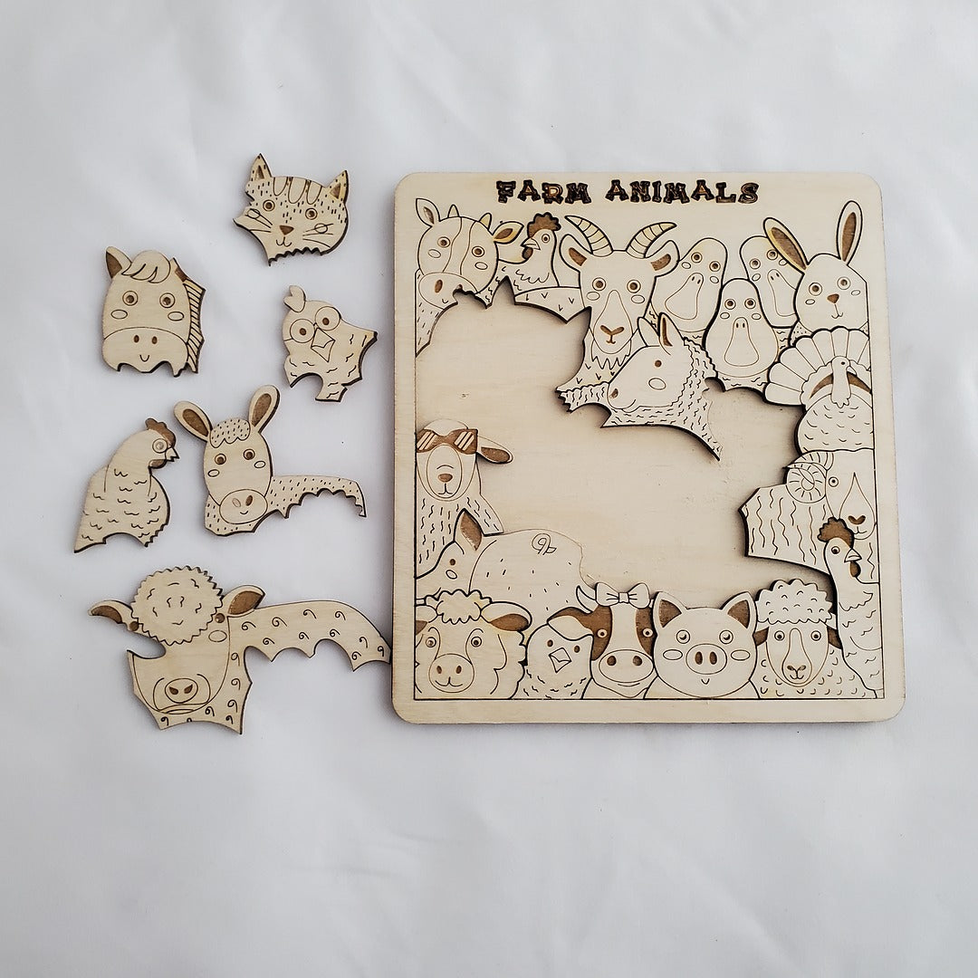 Wooden farm animal puzzle with pieces on a white background