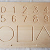 Shapes with numbers and upper letters on the other side