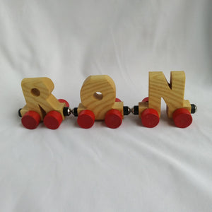 Wooden train and  individual letters