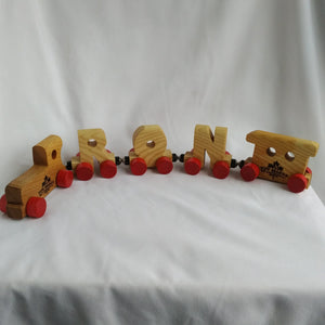 Wooden train and  individual letters