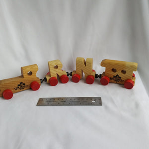 Wooden train and  individual letters