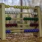 Abacus with nine beads and four colours.