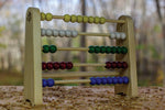 Abacus with nine beads and four colours. 3