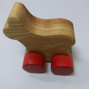 Wooden calf with wheels